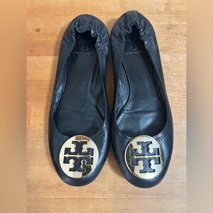 Tory Burch Black Flats with Gold Emblem